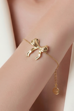 Lade das Bild in den Galerie-Viewer, ARMBAND `Sweet Bowtie´, gold
